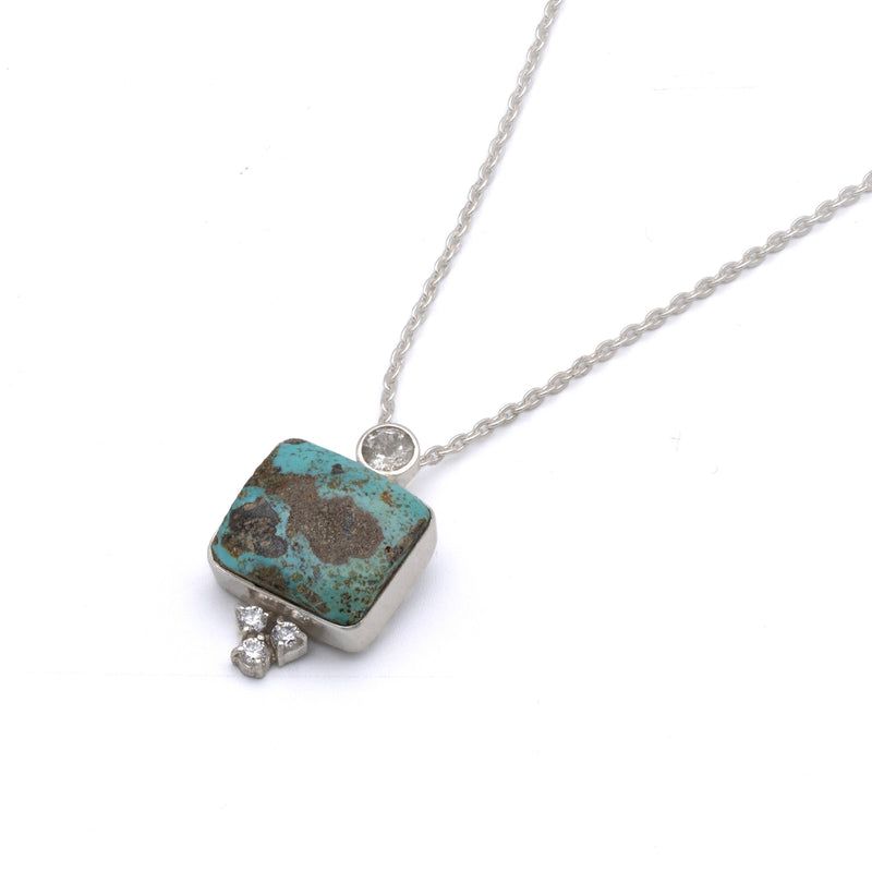 Turquoise topaz pendant necklace angled view
